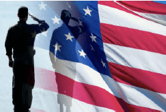 Military service member saluting the U.S. flag